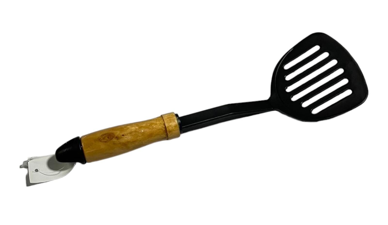 Espatula ancha calada nylon m/madera